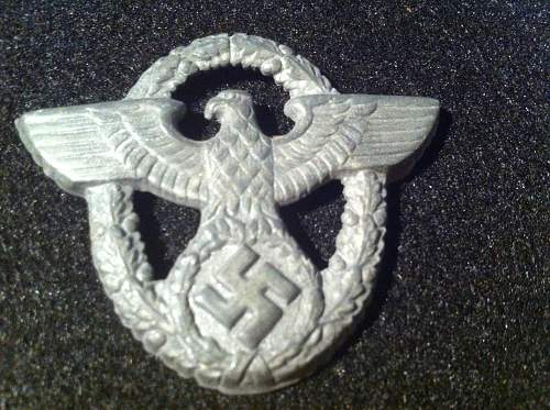 Police hat badge real or fake