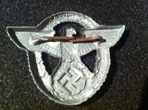 Police hat badge real or fake