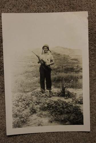 WW2 Era photo showing American GI holding an M1 .30 Cal Carbine. From my collection
