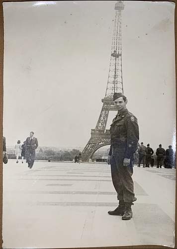 Original photo showing American Servicemen standing in front of the Eiffel Tower