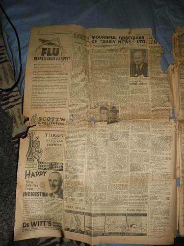 my collection of random newspaper articles  and comics  ww2 and Vietnam