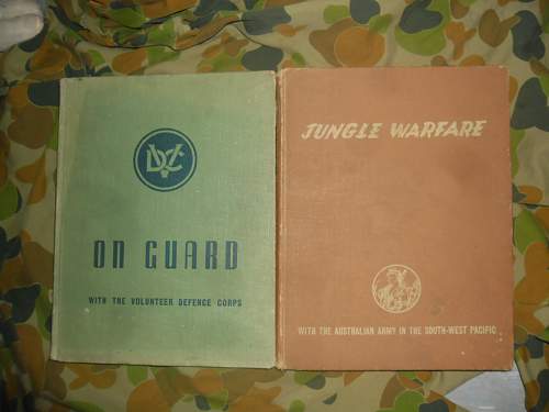 this weeks pick up's 2 australian ww2 era books and a old photo some aussies in uniform.