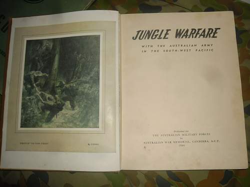 this weeks pick up's 2 australian ww2 era books and a old photo some aussies in uniform.