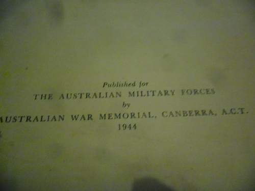 this weeks pick up's 2 australian ww2 era books and a old photo some aussies in uniform.