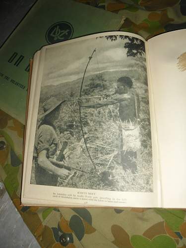 this weeks pick up's 2 australian ww2 era books and a old photo some aussies in uniform.