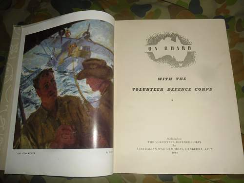 this weeks pick up's 2 australian ww2 era books and a old photo some aussies in uniform.