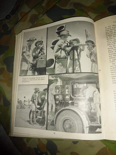 this weeks pick up's 2 australian ww2 era books and a old photo some aussies in uniform.