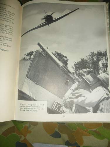 this weeks pick up's 2 australian ww2 era books and a old photo some aussies in uniform.