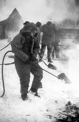 Red Army Soldiers wearing gas masks: anyone have photos?