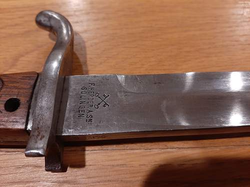 1915 Crown over L Butcher bayonet markings.