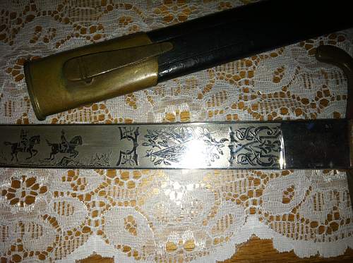 Please help me find some info on this sword please!!!!