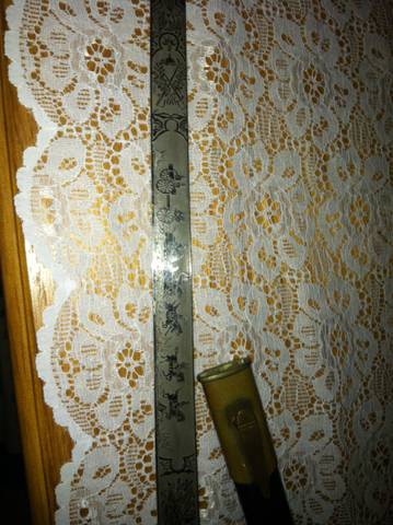 Please help me find some info on this sword please!!!!