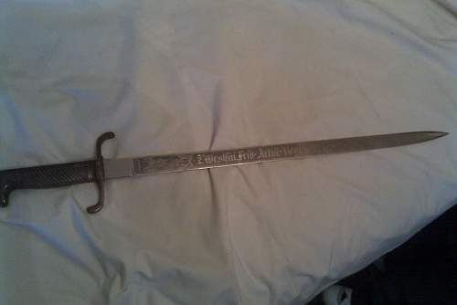 Please help me find some info on this sword please!!!!