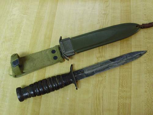 with this USMC fighting knife please.