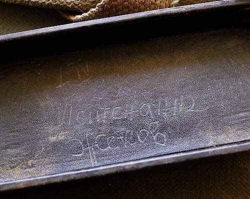 Can anyone translate this inscription inside a binocular cover?