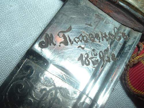 Inscribed name on a presentation sword