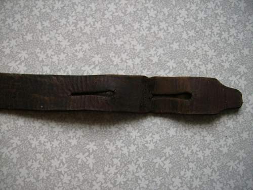 Unknown leather belt.