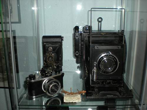 Cameras and insignia of U.S. war photographers