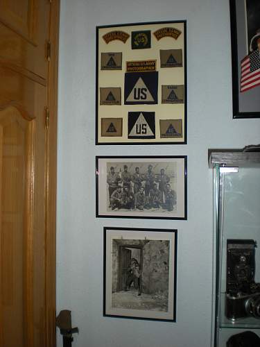 Cameras and insignia of U.S. war photographers