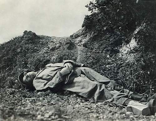 Cameras and insignia of U.S. war photographers