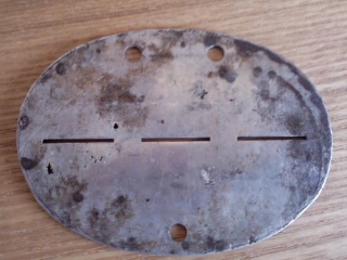 Help in identifying WWII German dog tags