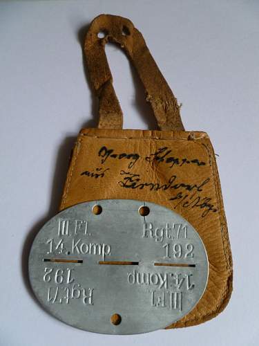 Help in identifying WWII German dog tags