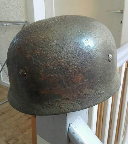 Original M38 Helmet with repro liner and chinstrap shell original?