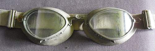 A tin of goggles with spare lens.