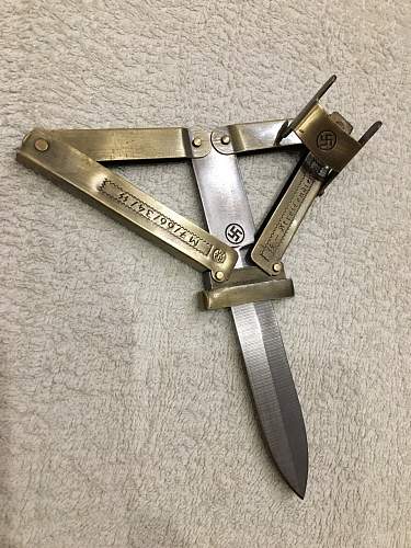 waffen ss knife butterfly knife value ? ? ? and is this original ?