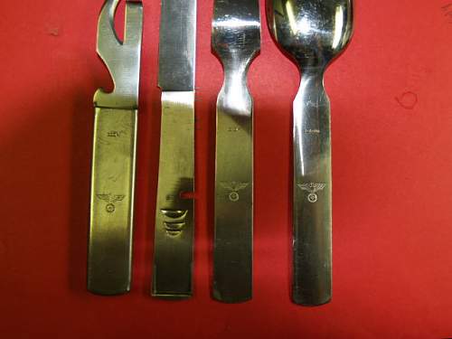 Knife, fork, spoon set in can opener type holder