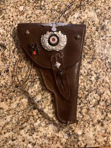 Any idea what kind of holster this is? I am also not knowledgable about any of the pins, so any information would be helpful.