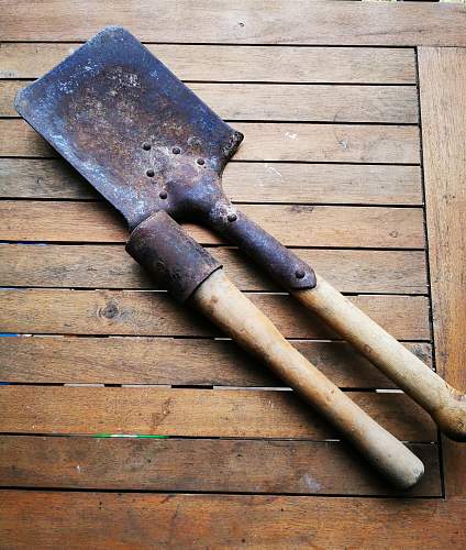 Attic found shovel, training hand grenade..