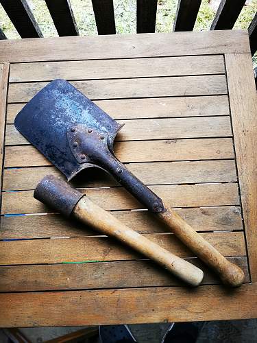 Attic found shovel, training hand grenade..