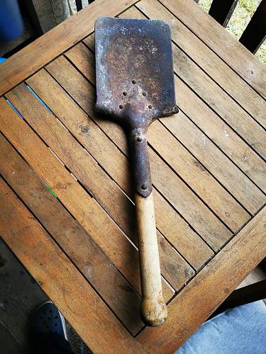 Attic found shovel, training hand grenade..