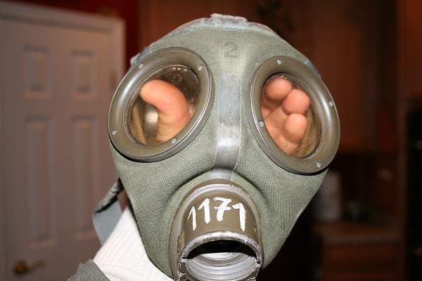 Gas mask and can.