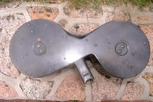 Saddle drum for a MG.13