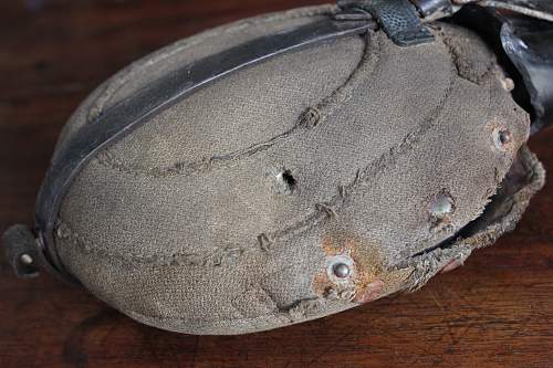 Bullet damaged canteen