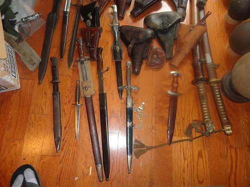 German Holsters Bayonets and a few other items I may buy