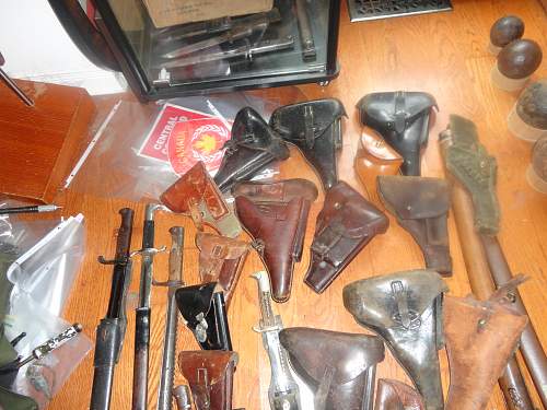 German Holsters Bayonets and a few other items I may buy