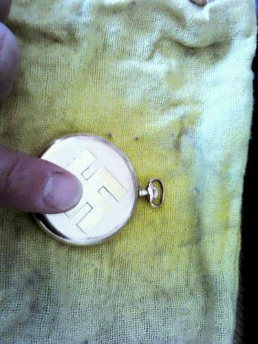 Pocket watch with eagle and swastika on face: fake or real?