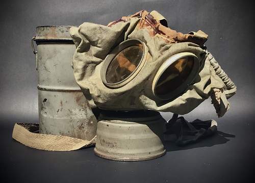 GM-15 Rubberised cloth gas mask and carrying can.