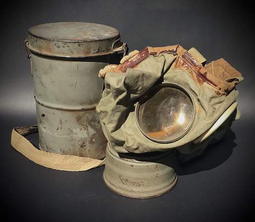 GM-15 Rubberised cloth gas mask and carrying can.
