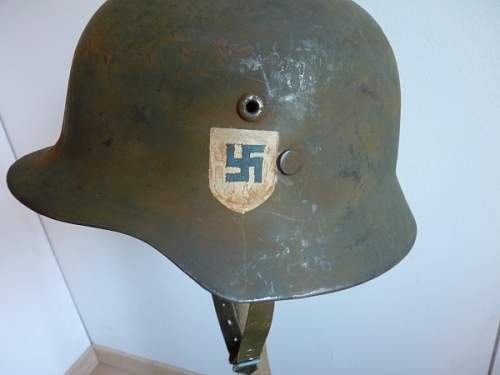 A supposedly genuine skull painted Finnish stahlhelm
