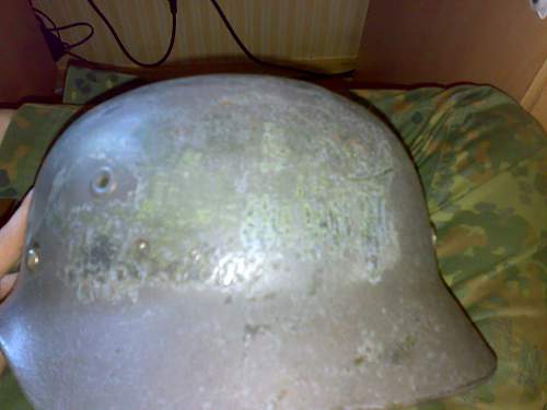 Odd camouflage colour on finnish M/55 steel helmet