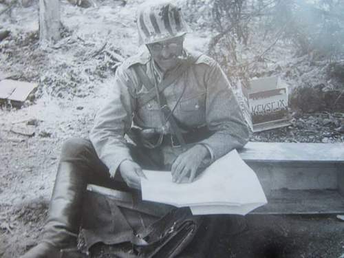 A photo of Finnish Jäger Major with camouflaged m17 stahlhelm