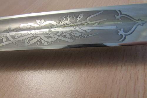 Fire bayonet with a motif pattern