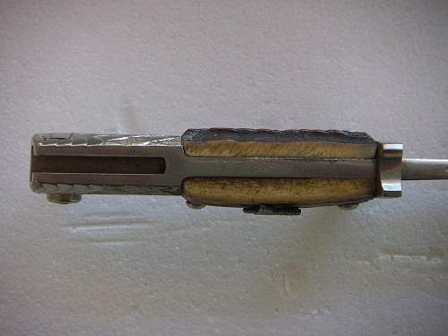 Is this a WWI bayonet converted for WWII Police use, and what are the unit markings? Thx!!!