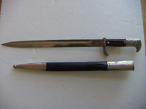 Is this a WWI bayonet converted for WWII Police use, and what are the unit markings? Thx!!!
