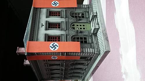 Need opinions on authenticity of buckles,  helmet badge. + an O-SCALE Nazi building