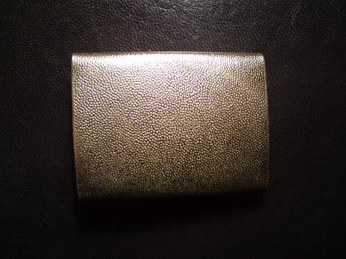 Unknown blank grained steel buckle.